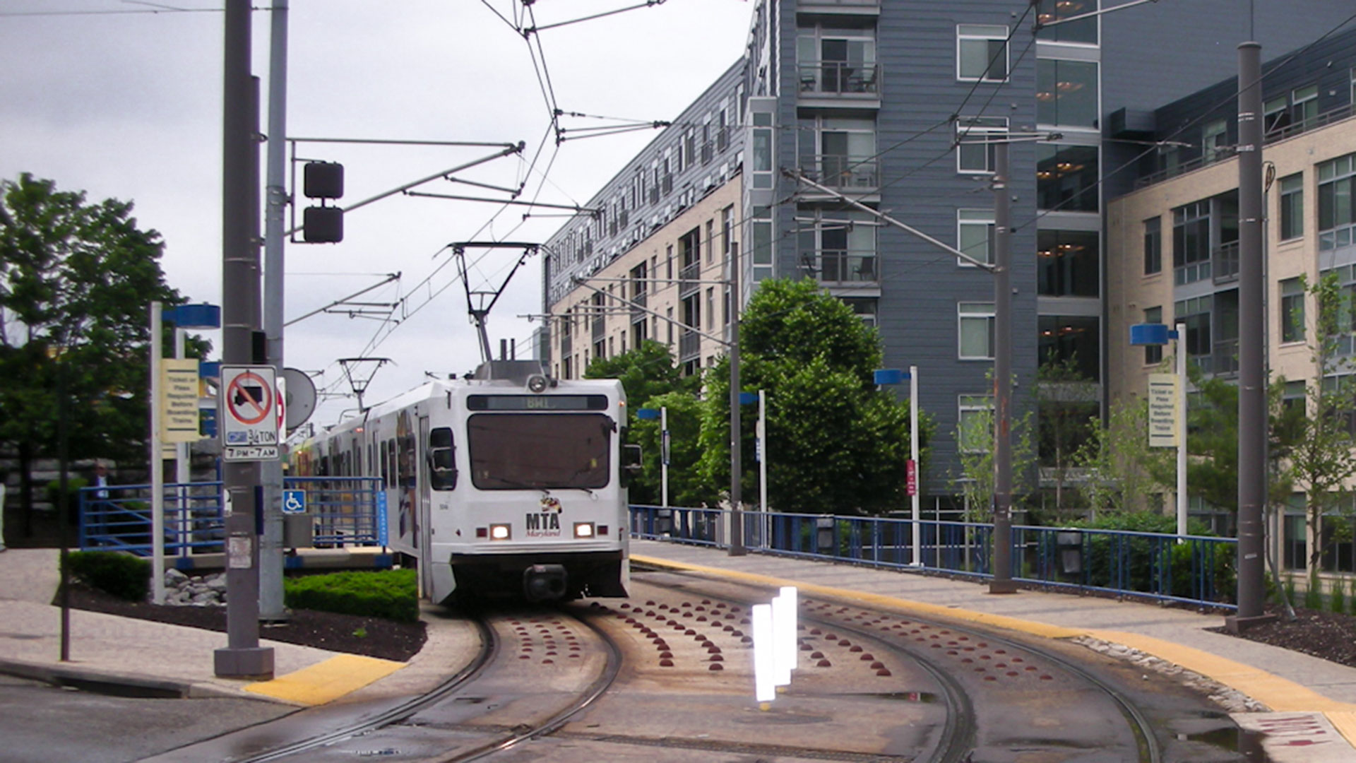 Light rail train pulling into station