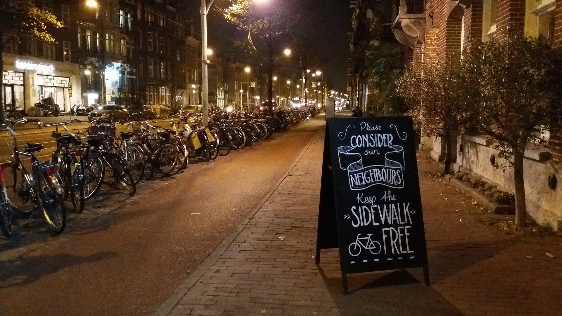 Sidewalks in Amsterdam encourage active transportation.