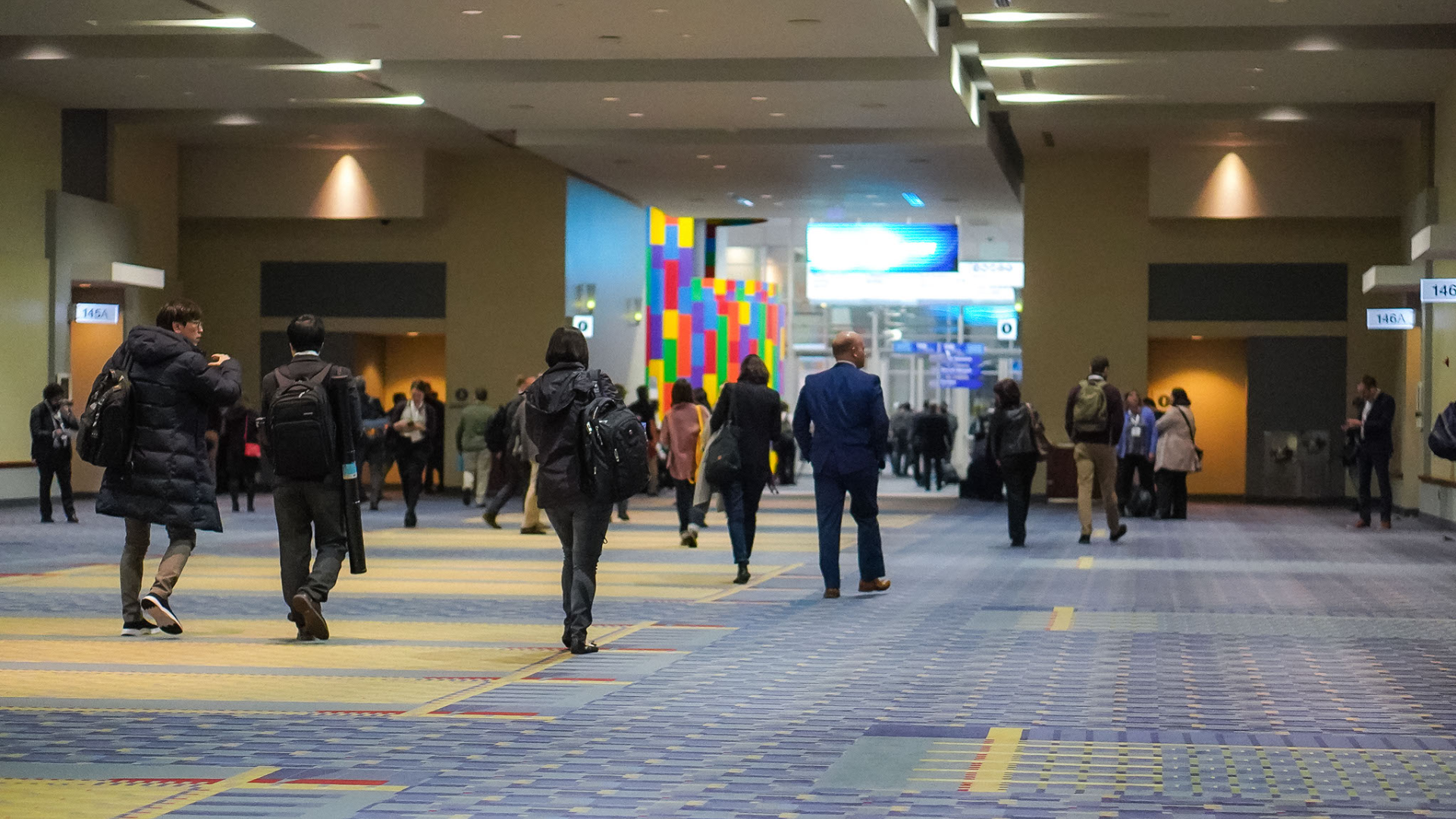 TRB Annual Meeting attendees walking in the Walter E. Washington Convention Center