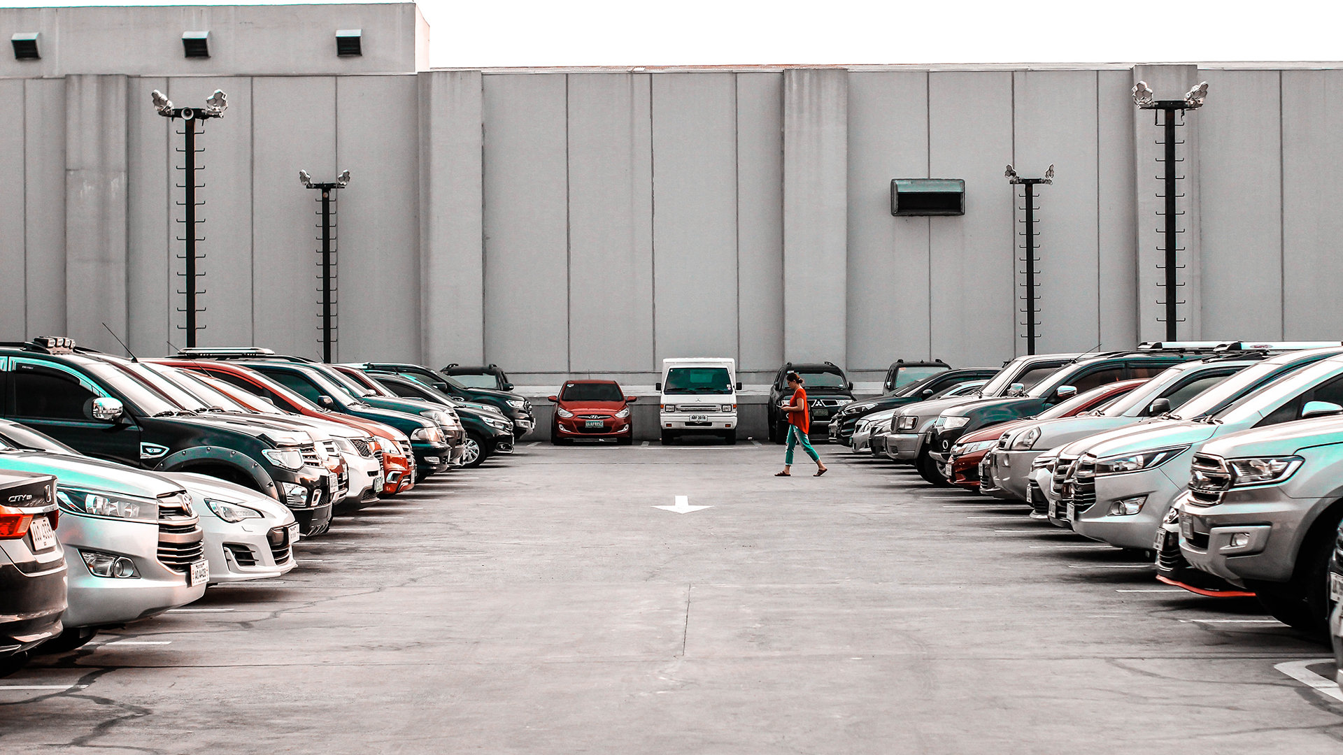 Cars facing each other in parking lot