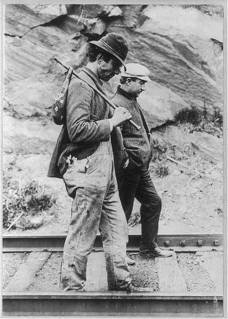 Two Hobos Walking Along Railroad Tracks, After Being Put Off a Train