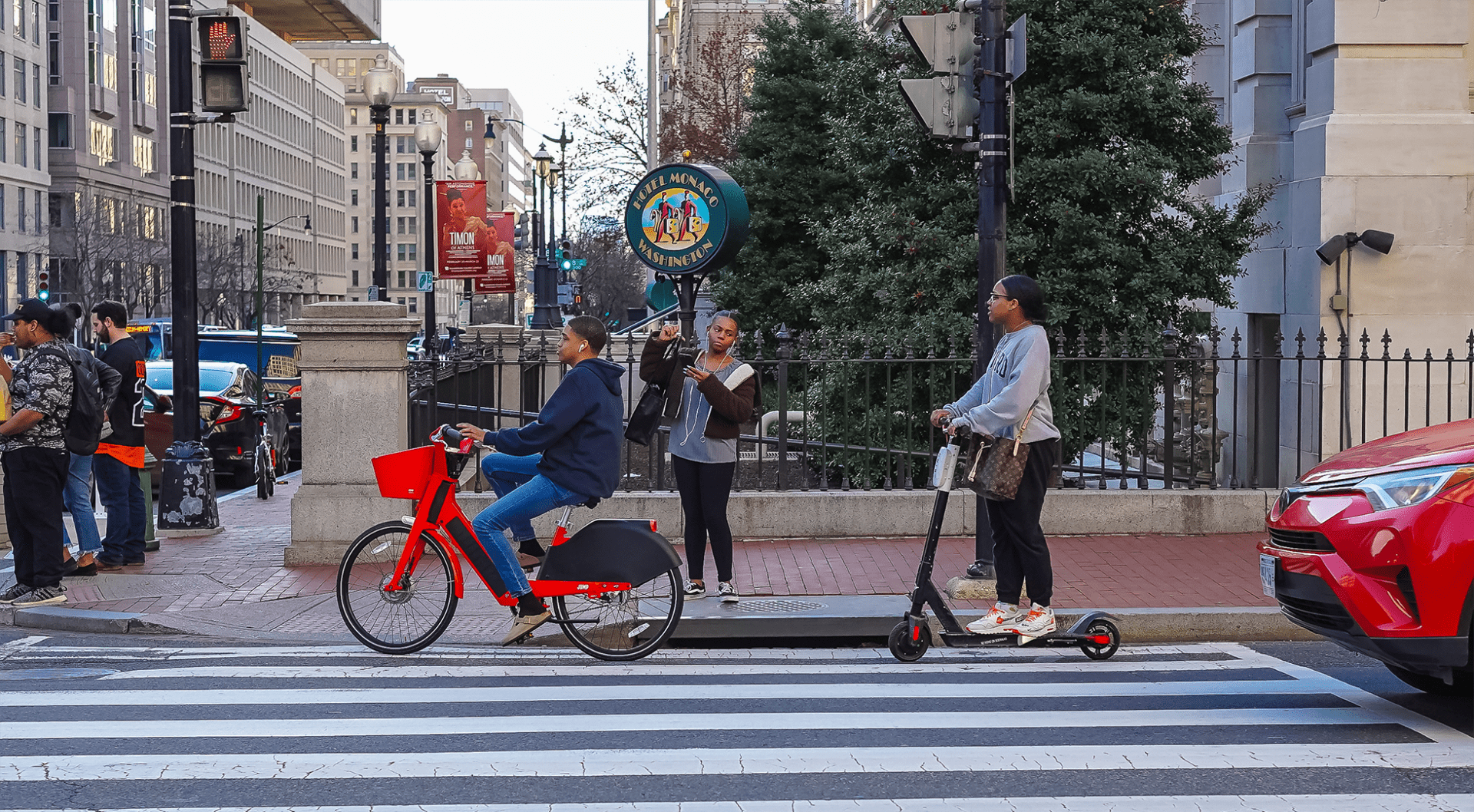 people riding e-bike and e-scooter on road