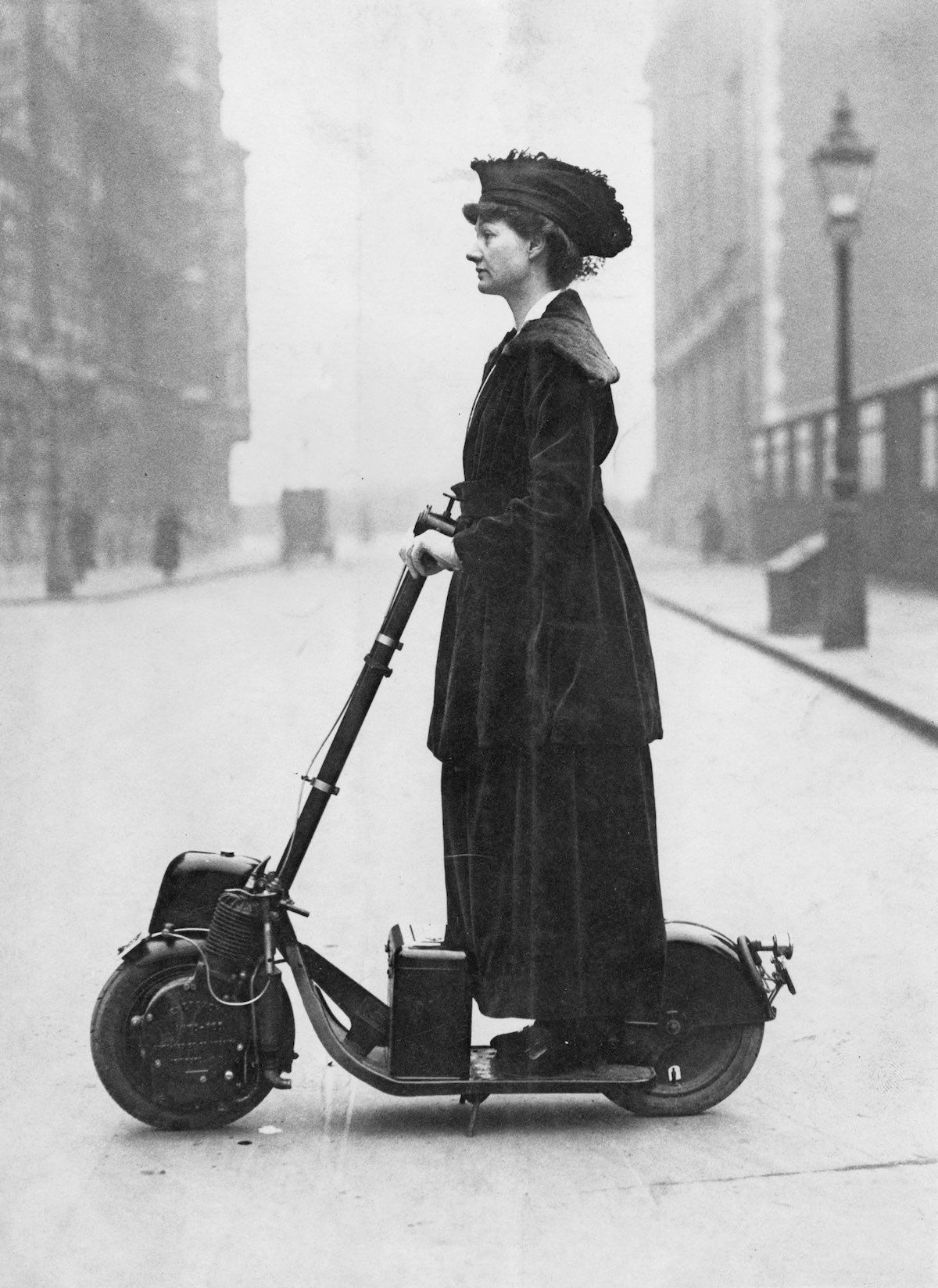 Suffragist Lady Florence Norman rides her motor-scooter in 1916 to work in London. 