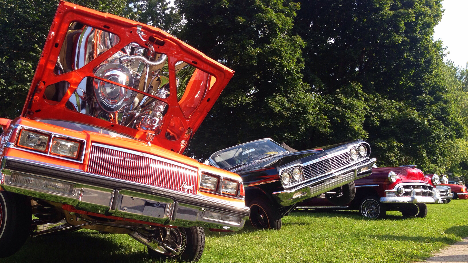 Low rider cars on display