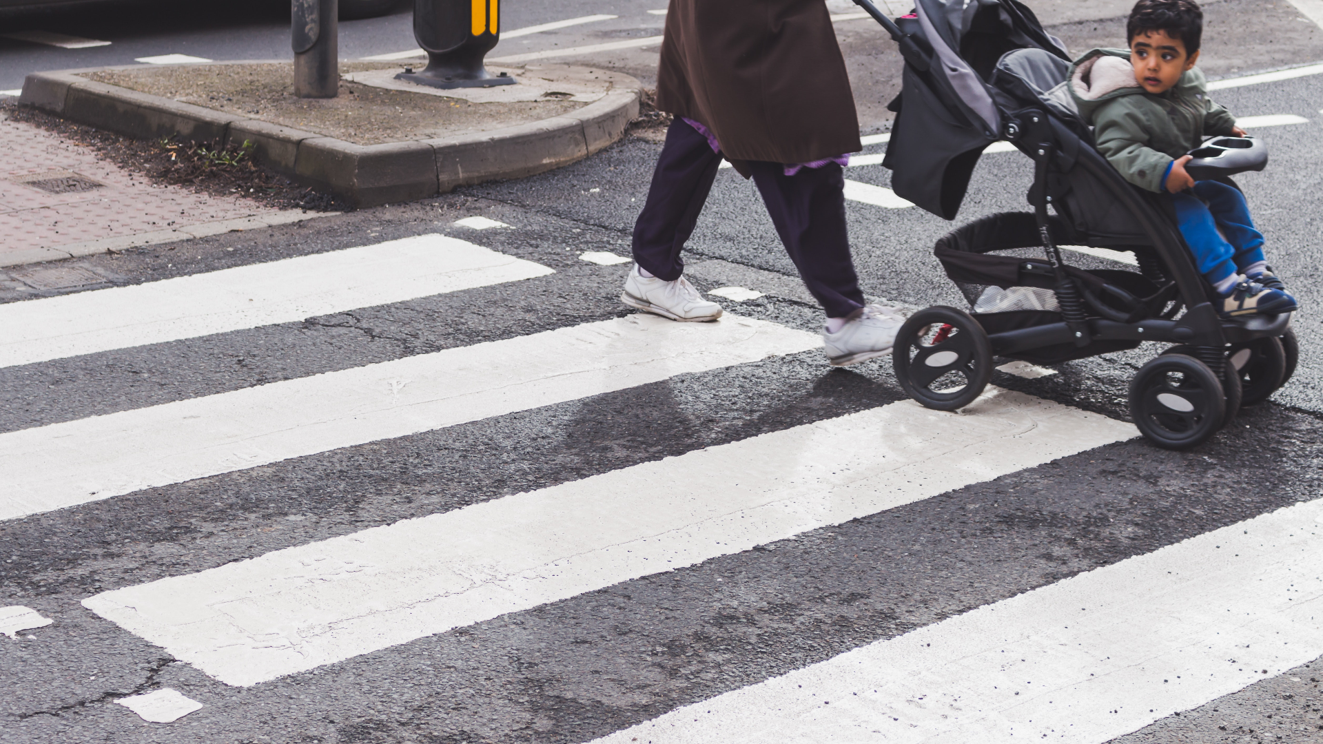 Mother and child crossing street