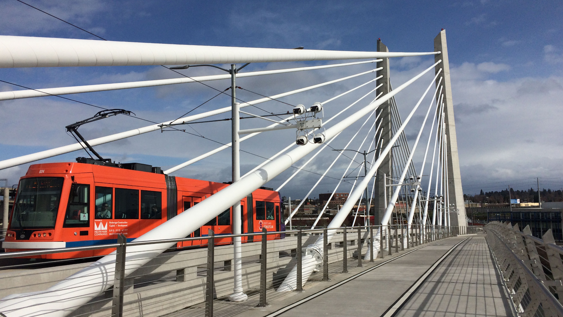 Light rail crossing the Tilikum Bridge in Oregon