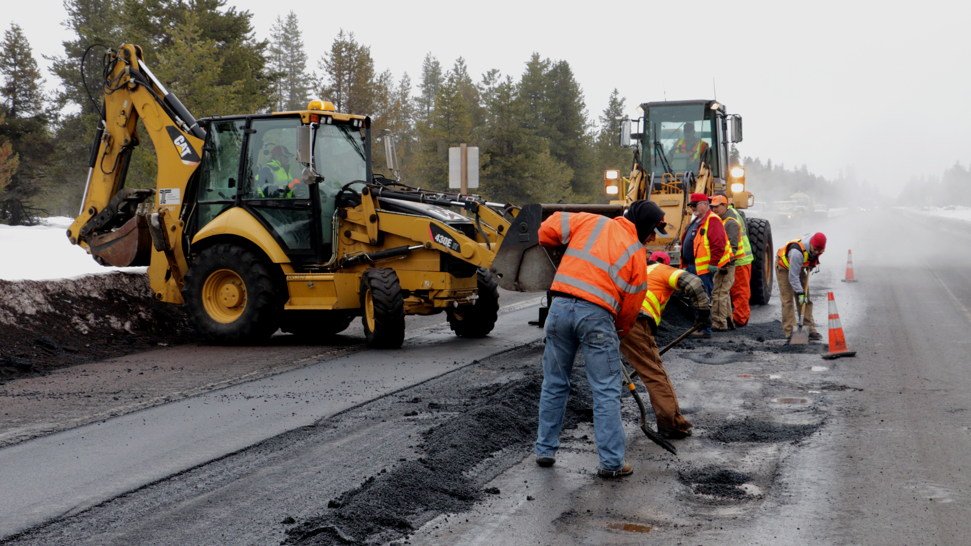 Oregon Department of Transportation crews fill potholes on U.S. 97.