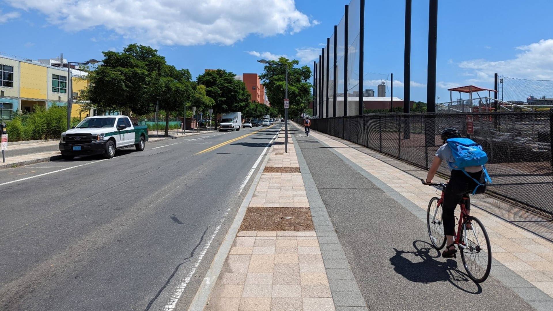 Street with car lanes and bike lane