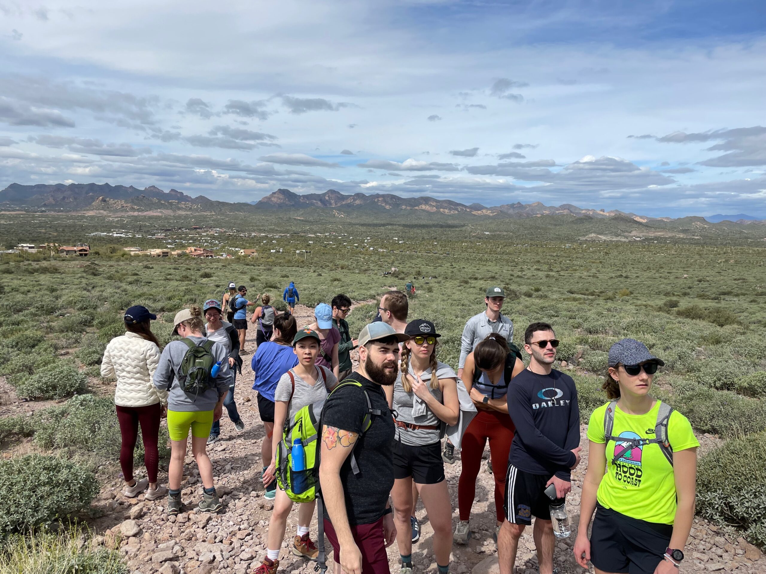 Group of people on a hike in the Arizona desert.