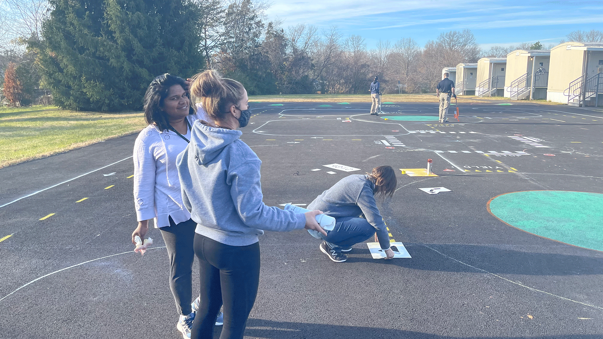 Volunteers installing a temporary traffic garden