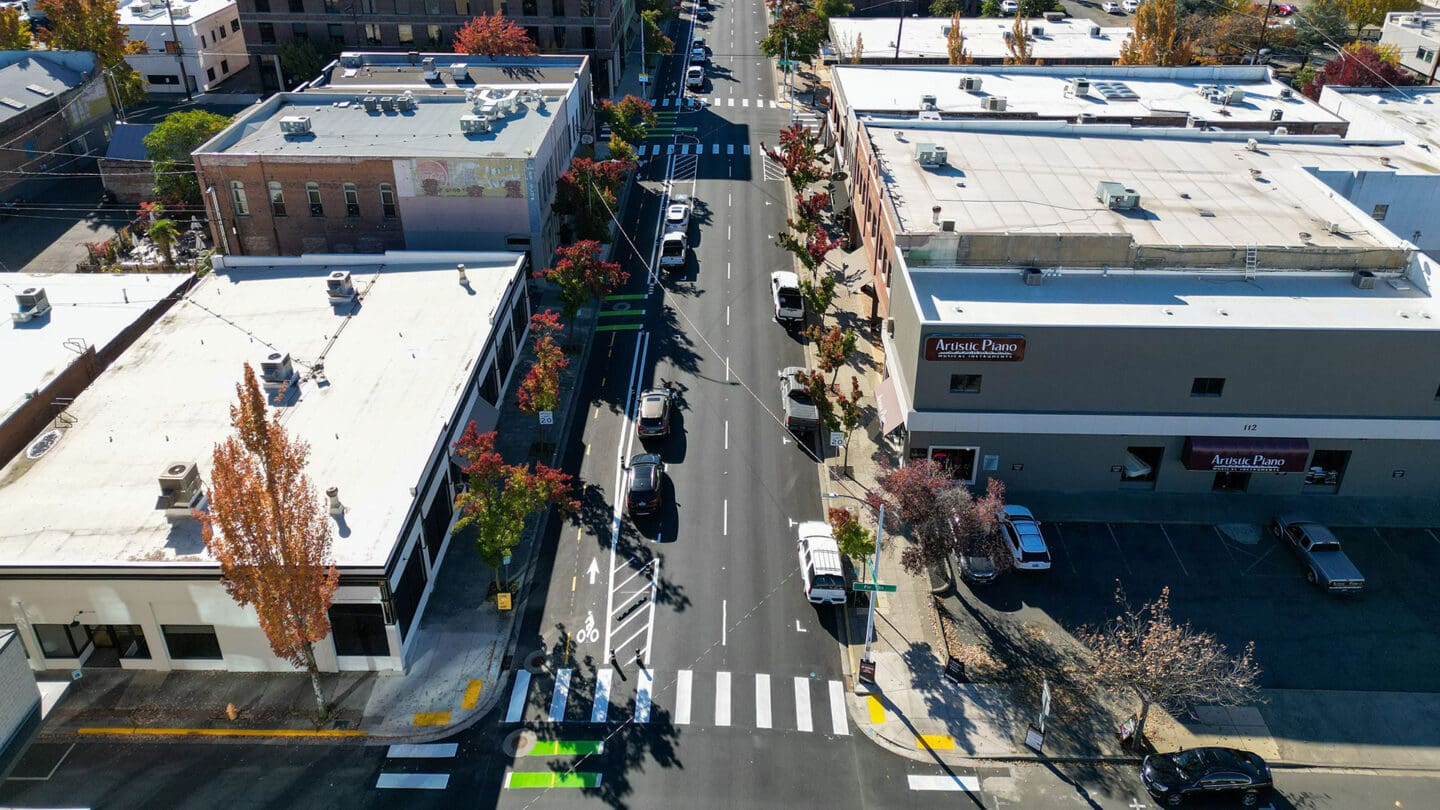 Aerial view of street in downtown Medford, Oregon with new bike lane