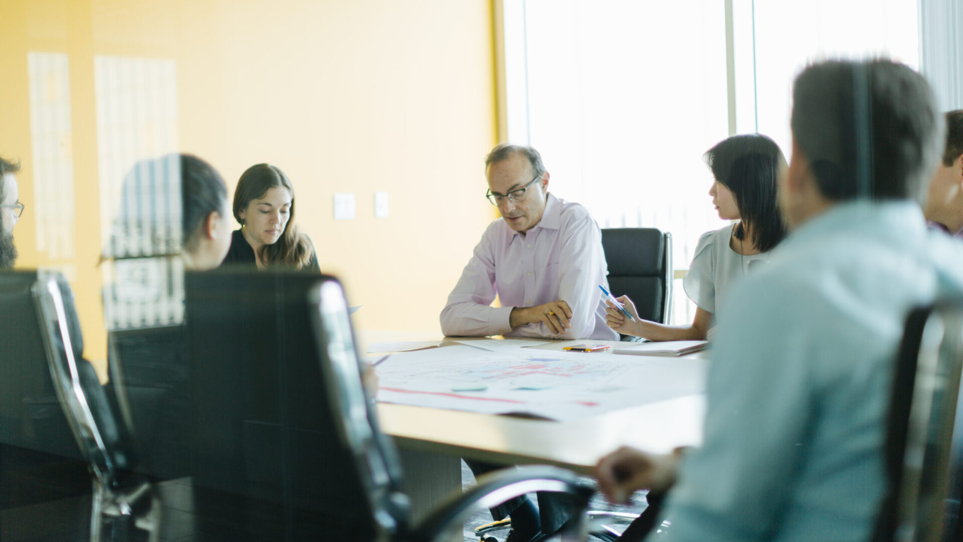 coworkers working around a table
