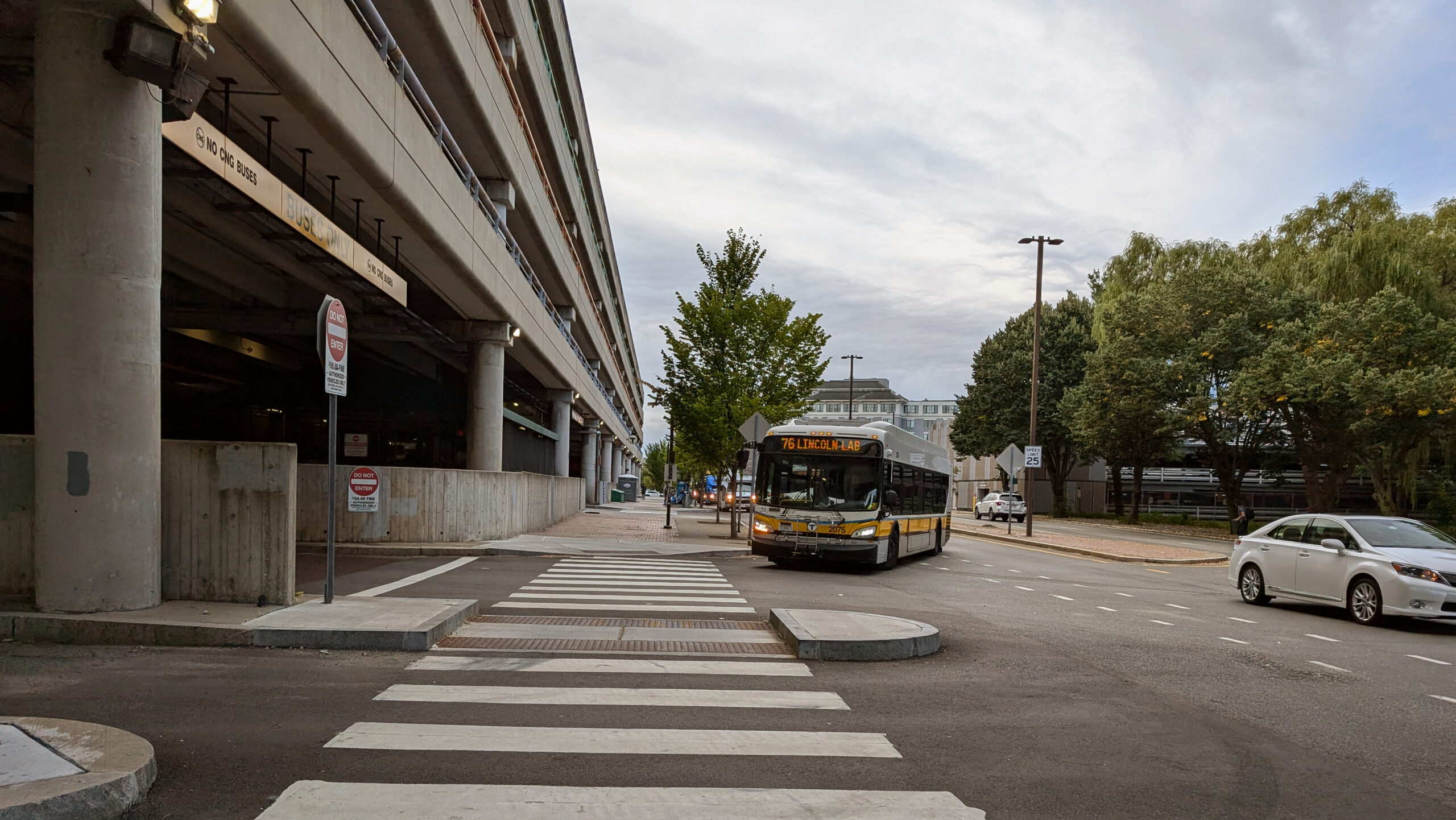 Bus turning on road.