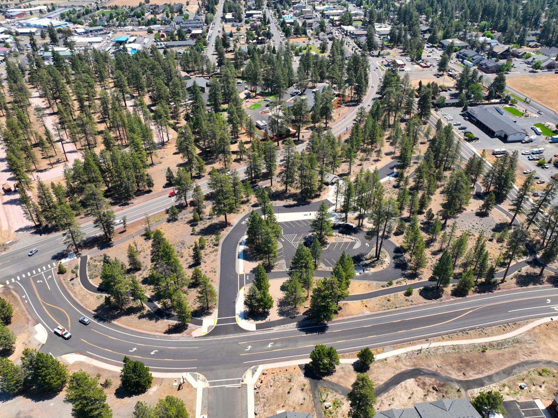 An upgraded mobility hub surrounded by pine trees.