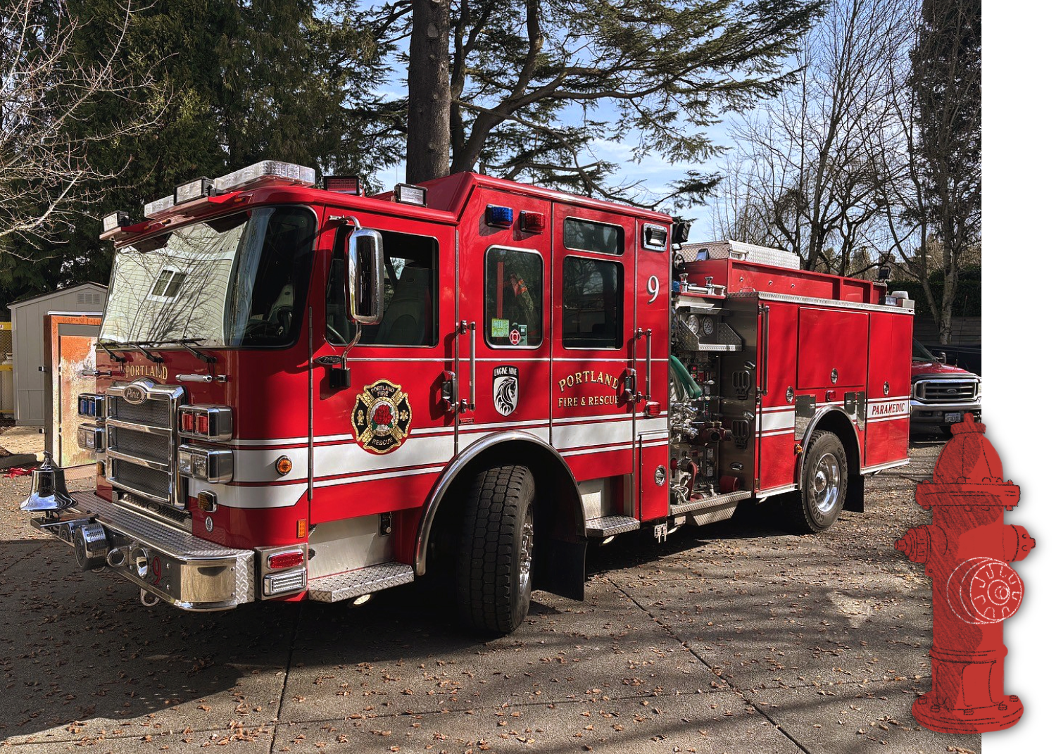 A shining and clean red fire engine parked in a parking lot.