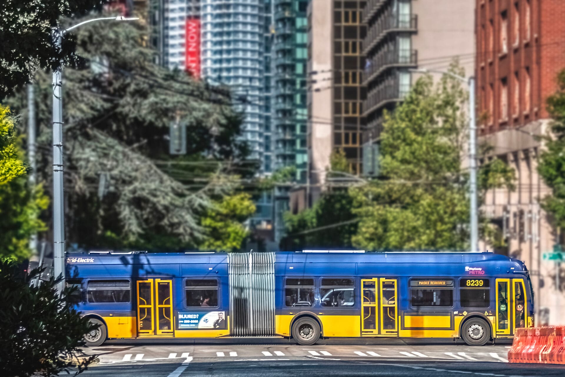 A King County Metro bus drives through a Seattle intersection.