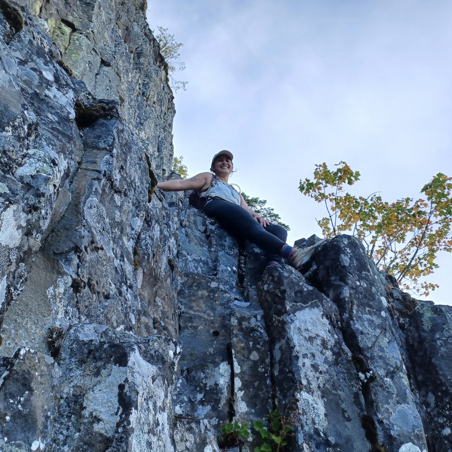 Mikayla Montoya at the top of a rock climb